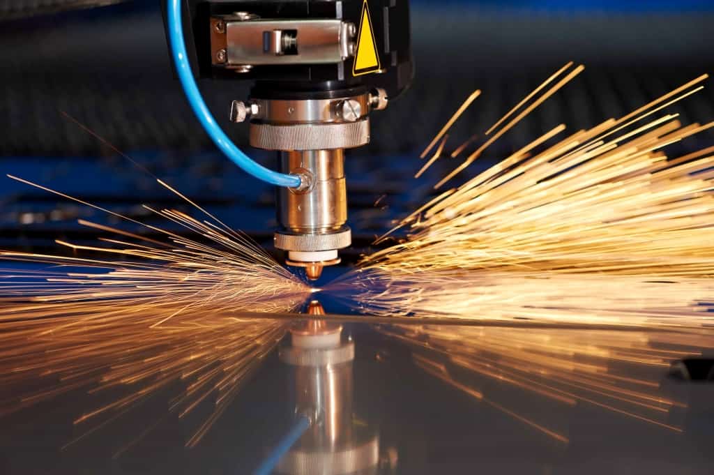 Laser cutting sheet metal with sparks - Marketing Zone